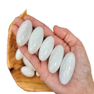 Venta al por mayor de piedras preciosas naturales Scolecite Shiva Reiki curación meditación cristales decorativos metafísicos huevo de dragón semiprecioso