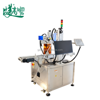 Machine de marquage laser UV à double tête pour l'intérieur et les côtés des bouteilles - Marquage permanent à grande vitesse de logos, dates et codes QR