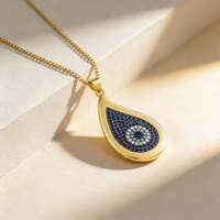 Collier QIKU au design créatif en forme de goutte d'eau, motif œil en cristal bleu, design original, bijoux en cuivre et zircon, cadeau pour femme et fille