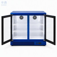 Réfrigérateur minibar à double zone de température pour hôtel, avec porte en verre trempé, adapté au réfrigération des boissons.