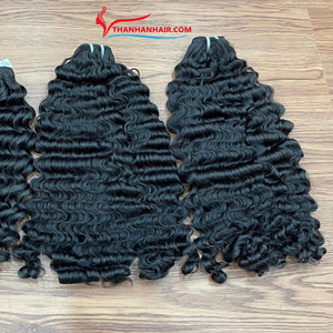 Extension de cheveux à trame bouclée birmane Cheveux humains vietnamiens Bouclés bruts birmans Paquets de cheveux - Product Image 1