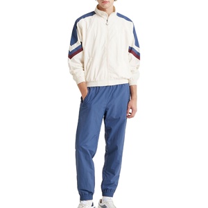 Ensemble de survêtement coupe-vent personnalisé avec fermeture éclair, pantalon ample en nylon, veste coupe-vent en nylon, ensemble de survêtement de jogging - Product Image 1