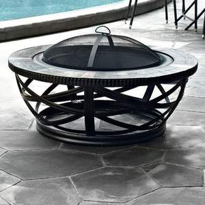Iron <b>fire</b> <b>pit</b> <b>with</b> mesh <b>lid</b> ensuring safety for children and pets during outdoor evening family garden gatherings - Product Image 1