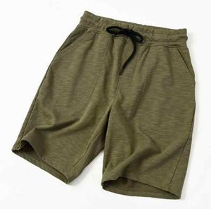 Pantalones cortos deportivos de lona sólida para hombre, transpirables, de secado rápido, gimnasio de verano con mezcla de algodón suave y entrenamiento diario de ajuste relajado - Product Image 1