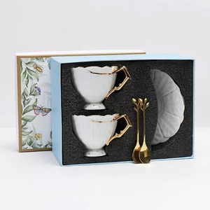 European High Quality Embossed Leaf Pattern Bone <b>China</b> Coffee <b>Cup</b> and Saucer Set featuring gold rim and handle - Product Image 6