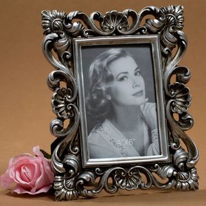 Elegant metal photo <b>frame</b> for contemporary interiors offering strong build quality perfect wall table display ideas - Product Image 1