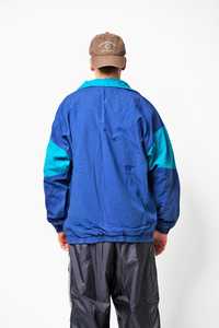 Veste vintage des années 90 en couleur bleue Veste de survêtement rétro en nylon léger veste coupe-vent pour piste de sport des années 80 - Product Image 3