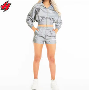 Conjunto corto de 2 piezas de alta calidad Unisex 2024, Top corto con cuello levantado y pantalones cortos de nailon con cremallera cortavientos para hombres y mujeres - Product Image 1