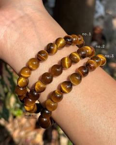 Vente en gros de bracelets d'amour en perles d'oeil de tigre Accessoires de guérison polis élégants et à la mode - Product Image 1