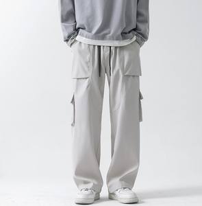 High Quality 100% Polyester Relaxed Fit UtilityTrousers Baggy Drawstring Pants <b>Wide</b> <b>Leg</b> Multi-Pocket Streetwear <b>Cargos</b> For Men - Product Image 1