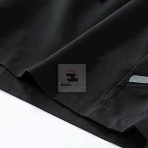 Pantalones cortos deportivos de cintura elástica para gimnasio para hombre, estilo informal con patrón sólido - Product Image 4