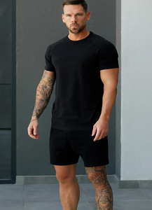 Vente en gros de shorts de gym de couleur noire en jersey pour hommes OEM avec logo personnalisé shorts d'entraînement en coton respirant et extensible fournisseur de vêtements de sport - Product Image 3