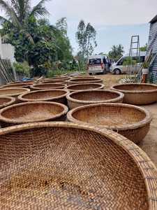 Handmade round Bamboo Boat with Durable Wood Hull Vietnam's Traditional Coastal Activity Vessel - Product Image 2