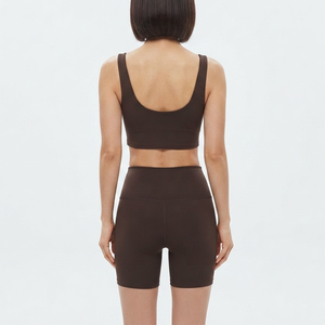Soutien-gorge de sport OEM pour femme avec maintien moyen, dos croisé, rembourré, design uni, coussinets amovibles, respirant, pour le yoga et la course à pied - Product Image 2