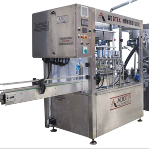 Machine automatique de remplissage et de bouchage de liquides pour verre |   Panneau tactile en acier inoxydable SS304/SS316 |   Précision multi-buses - Product Image 1