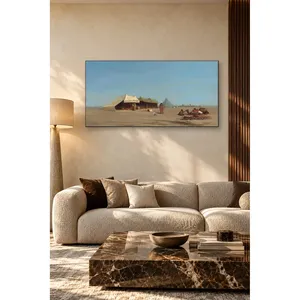 Impresión en lienzo de Fida Frere: Tienda de campaña en el desierto y camellos bajo el cielo azul - Product Image 1