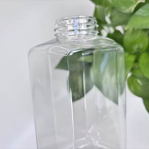 थोक 550/650 मिली चाय और स्पष्ट वर्ग पालतू जानवरों की बोतलें बड़ी क्षमता कस्टम लोगो परिवार और वाणिज्यिक त्वचा देखभाल कंटेनर - Product Image 3