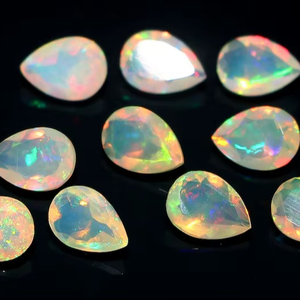 Ópalo Etíope Natural Grado AA, Corte Pera Facetado, Gema Suelta Blanca 4x6mm, 0.5-1.3 Quilates, Juego de Color/Fuego - Product Image 1