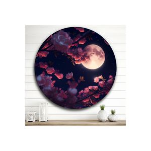 Tavolo in vetro illuminato con rami di albero rosa e luna piena