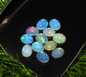 โอปอลเอธิโอเปียธรรมชาติคุณภาพสูง 12 เม็ด ขนาด 7x9 มม. รูปทรงวงรี สีเวโล แบบหลวม สำหรับทำเครื่องประดับ พร้อมคุณสมบัติการเปลี่ยนสี/เปล่งไฟ - Product Image 1