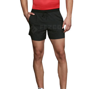 Pantalones cortos para correr para hombre de secado rápido con logotipo personalizado 2025, pantalones cortos informales de entrenamiento de Color sólido de nuevo diseño con cierre de cintura elástica - Product Image 1
