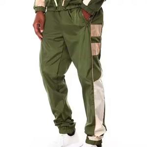 Survêtement coupe-vent deux pièces avec fermeture à glissière complète pour hommes, costume de sport avec logo personnalisé d'usine OEM et tissu de qualité doux et confortable - Product Image 3