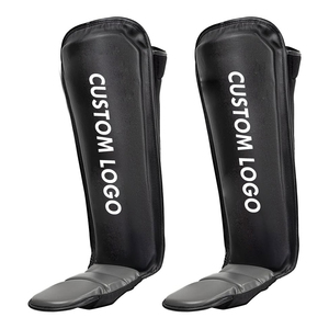 Protège-tibias de boxe noirs de qualité supérieure, logo personnalisé, durables, légers, réglables, protège-tibias et protège-pieds, équipement de boxe protecteur - Product Image 1