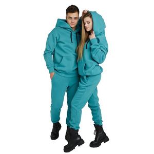 Conjunto de chándal Unisex esencial de invierno con Sudadera con capucha de lana cálida y pantalones de Jogger perfectos para ropa de calle y ropa informal diaria - Product Image 1