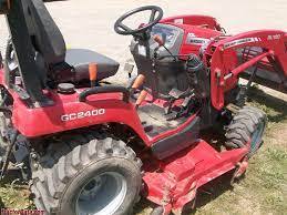 Cargador de tractor de ruedas Massey Ferguson GC2400 4x4 usado barato con quitanieves de montaje frontal y plataforma de corte de montaje medio, la mejor calidad - Product Image 2