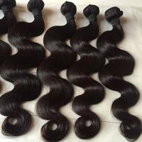 Sampel gratis harga termurah rambut India mentah 40 inci bundel rambut manusia 12A kelas 40-60 inci rambut tidak diproses keriting gelombang dalam