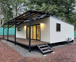 บ้านคอนเทนเนอร์สำเร็จรูปสมัยใหม่พร้อมระเบียงมีหลังคาและพื้นไม้สำหรับอยู่อาศัย + จัดส่งฟรี - Product Image 1