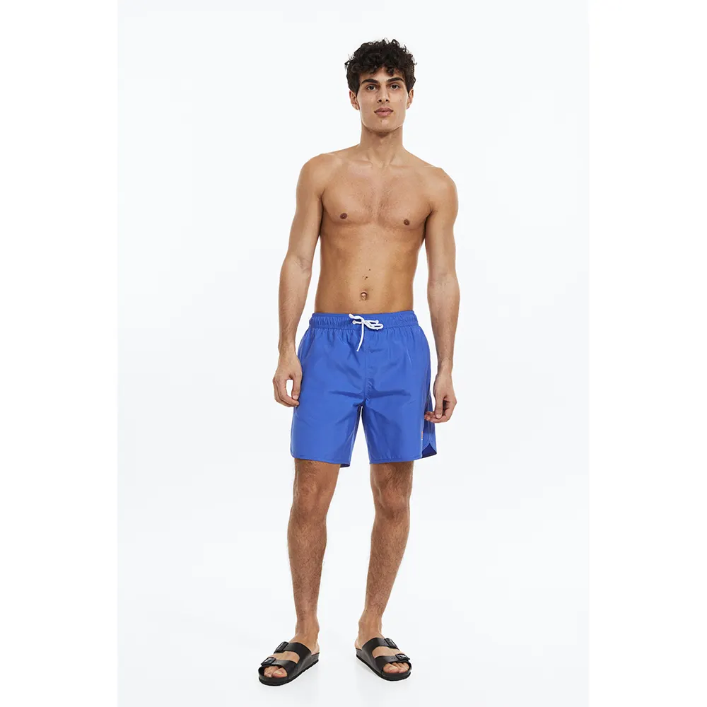 Hot Sale Men's beach wear shorts de natação de alta qualidade personalizado sublimação Imprimir Bandeira Americana Design board curto para homens em marca