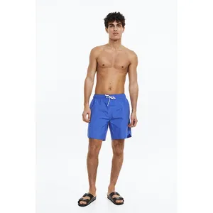 Offre Spéciale Vêtements de plage pour hommes shorts de bain haute qualité sublimation personnalisée impression drapeau américain conception short de planche pour hommes de marque