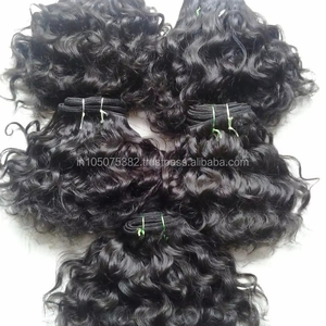 Extensiones de cabello humano Remy indio sin procesar directo de la India, extensiones de cabello ondulado natural sin procesar baratas tejidas directamente - Product Image 1