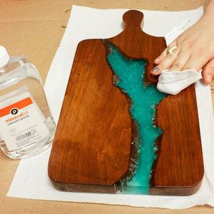 Premium resin chopping <b>board</b> handmade with crystal clear resin layer across wood grain perfect for food slicing and plating - Product Image 3