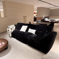 Canapé d'angle en forme de L rembourré en éponge noire moderne avec larges accoudoirs pour appartement et hôtel