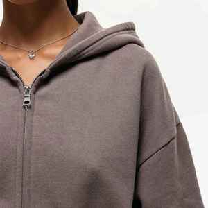 Conjunto de chándal de dos piezas de algodón de alta calidad personalizado ropa informal bordada con parte superior hueca pantalones largos acampanados Botón de longitud completa - Product Image 2