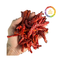 Chili séché rouge du Vietnam de type entier et coupé avec une riche saveur épicée, processus de séchage naturel, approvisionnement en vrac avec emballage personnalisé