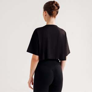 เสื้อยืดออกกำลังกายเอนดูรา โมชั่นสีดำ ดีไซน์ระบายอากาศได้ดี - Product Image 2