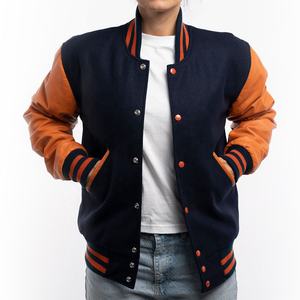 Veste de sport pour femme sur mesure en laine bleu royal et manches en cuir orange brûlé, respirante - Product Image 1