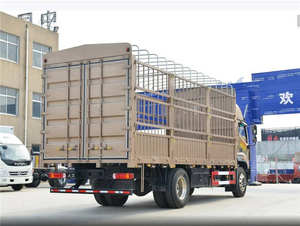 Camion utilitaire à ridelles 4x2 d'occasion, 10-15 tonnes, pour transport d'animaux, diesel, bon état, conduite à gauche - Product Image 3