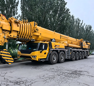 Grúa telescópica amarilla XCA1000G9-1 de servicio pesado con motor, bomba y engranajes, altura de elevación de 153 m para patios de construcción - Product Image 5