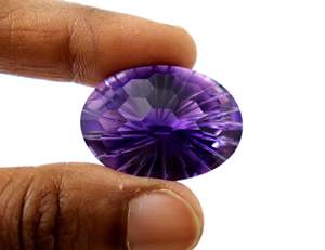 Piedra de tanzanita púrpura sin tratar sin calentar Piedra de nido de abeja de tanzanita certificada 46CTOval Corte de la mejor calidad Precios al por mayor Gema - Product Image 1