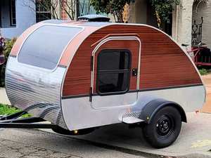 High Quality Compact Teardrop Caravan Trailer for Camping, Road Trips and Outdoor Recreation with Comfortable Sleeping Area - Product Image 1