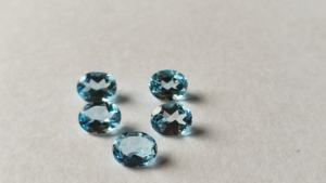 Chất lượng cao 3x5mm -15x20mm hình bầu dục mặt bầu trời màu xanh Topaz giá bán buôn đá quý tự nhiên lỏng cắt Un đá nóng nhà máy - Product Image 6