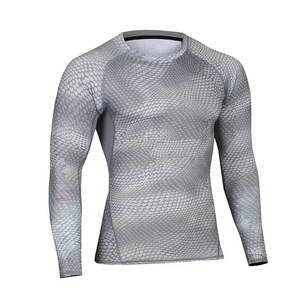 T-shirt de compression à manches courtes pour homme fabriqué au Pakistan Rash Guard personnalisé Entraînement Fitness Gym Vêtements de sport en vrac OEM Haut - Product Image 1