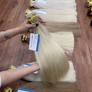 Cheveux blonds vietnamiens en vrac en stock, de 20 à 28 pouces, lisses naturels, disponibles en stock maintenant, prêts à être expédiés - Product Image 1