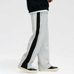 กางเกงจ็อกเกอร์สำหรับผู้ชายกางเกงวิ่งจ็อกเกอร์ผ้ายืดปะติดโลโก้ตามสั่ง - Product Image 3