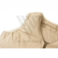 Blouson sans manches matelassé imperméable unisexe à col montant couleur unie avec logo personnalisé pour l'hiver