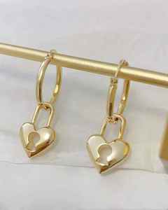 Pendientes <span class=keywords><strong>de</strong></span> <span class=keywords><strong>Oro</strong></span> Real <span class=keywords><strong>de</strong></span> 18K con Forma <span class=keywords><strong>de</strong></span> Corazón <span class=keywords><strong>de</strong></span> Lerca, Estilo Minimalista y Delicado, <span class=keywords><strong>Aro</strong></span> <span class=keywords><strong>de</strong></span> Corazón <span class=keywords><strong>de</strong></span> <span class=keywords><strong>Oro</strong></span> Puro para Mujer, Moderno y a la Moda - Product Image 1